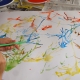 Abstract art for kids with paint, water and straws